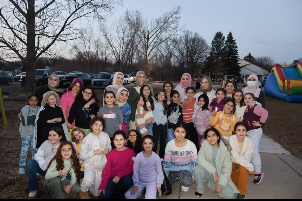 A picture of me during one of the last days of the Winter Program; I'm standing on the far right corner in the back. Around me are the girls and the other counselors.